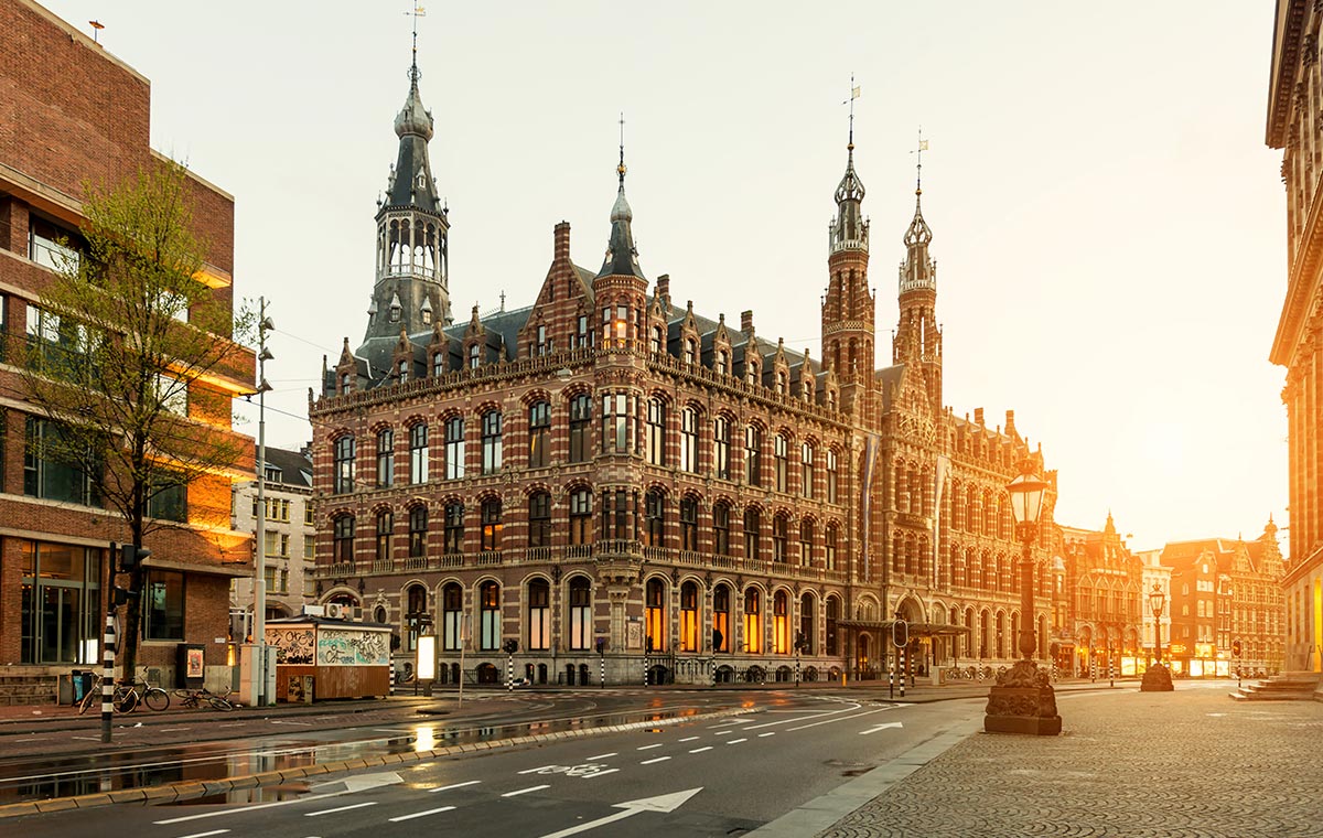 Snag deals on business class flights to Amsterdam to revel in the activity and architecture of Dam Square. - IFlyFirstClass
