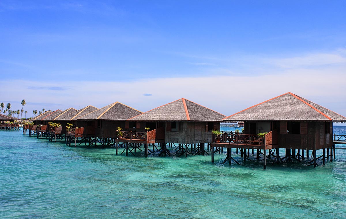 Relish the colorful coral reef with first class tickets to Malaysia. - IFlyFirstClass