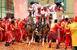 First Class Flight to Ivrea Carnival in Italy - IFlyFirstClass